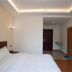 Отель Xiamen Tianhaixuan Holiday Villa Китай, Сямынь - отзывы, цены и фото номеров - забронировать отель Xiamen Tianhaixuan Holiday Villa онлайн комната для гостей фото 4
