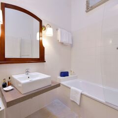 Отель Al Cappello Rosso Suite Apartments Италия, Болонья - отзывы, цены и фото номеров - забронировать отель Al Cappello Rosso Suite Apartments онлайн ванная фото 2