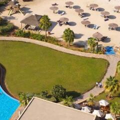 Отель Radisson Blu Resort, Sharjah ОАЭ, Шарджа - 6 отзывов об отеле, цены и фото номеров - забронировать отель Radisson Blu Resort, Sharjah онлайн бассейн фото 3