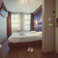 Отель Tourist Inn Budget Hotel - Hostel Нидерланды, Амстердам - 1 отзыв об отеле, цены и фото номеров - забронировать отель Tourist Inn Budget Hotel - Hostel онлайн комната для гостей фото 5