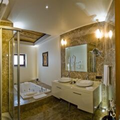 Cappadocia Cave Resort&Spa Турция, Учисар - отзывы, цены и фото номеров - забронировать отель Cappadocia Cave Resort&Spa онлайн ванная