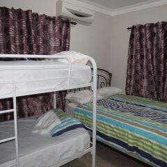 Отель Hostel Punta Cana Доминикана, Пунта Кана - отзывы, цены и фото номеров - забронировать отель Hostel Punta Cana онлайн комната для гостей фото 5