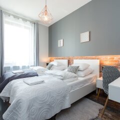 Апартаменты WarsawLiving - Cybernetyki Apartments комната для гостей фото 3