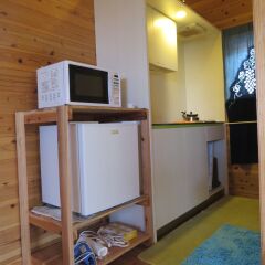 Отель Cottage Orange House Yakushima Якусима удобства в номере