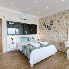 Villa Sur by Akdenizvillam Турция, Калкан - отзывы, цены и фото номеров - забронировать отель Villa Sur by Akdenizvillam онлайн комната для гостей фото 2