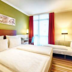 Leonardo Hotel & Residenz München комната для гостей фото 12