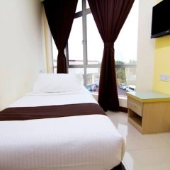 Отель Sg Pelek Hotel Малайзия, Сунгай-Пелек - отзывы, цены и фото номеров - забронировать отель Sg Pelek Hotel онлайн комната для гостей фото 4