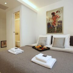 Апартаменты Ramblas Deluxe Apartments комната для гостей фото 5
