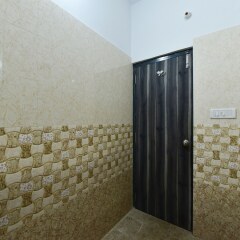 OYO 23085 Baba Hotel ванная