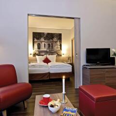 Отель Aparthotel Adagio Berlin Kurfürstendamm Германия, Берлин - 13 отзывов об отеле, цены и фото номеров - забронировать отель Aparthotel Adagio Berlin Kurfürstendamm онлайн комната для гостей фото 4
