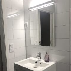 Отель Kvadraturen Apartments Social Норвегия, Кристиансанд - отзывы, цены и фото номеров - забронировать отель Kvadraturen Apartments Social онлайн ванная