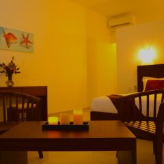 Отель Whispering Palms Hotel Шри-Ланка, Бентота - отзывы, цены и фото номеров - забронировать отель Whispering Palms Hotel онлайн удобства в номере