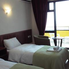 West Ada Inn Hotel комната для гостей