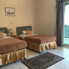 Отель Golden Beach Motel ОАЭ, Шарджа - 1 отзыв об отеле, цены и фото номеров - забронировать отель Golden Beach Motel онлайн комната для гостей фото 4