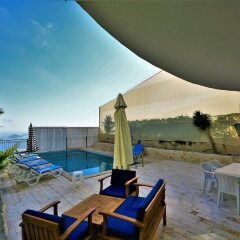 Villa Zumrut 4 by Akdenizvillam Турция, Патара - отзывы, цены и фото номеров - забронировать отель Villa Zumrut 4 by Akdenizvillam онлайн бассейн фото 2