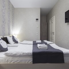 Гостиница Roomp Tsvetnoj Bulvar Mini-Hotel в Москве отзывы, цены и фото номеров - забронировать гостиницу Roomp Tsvetnoj Bulvar Mini-Hotel онлайн Москва комната для гостей фото 2