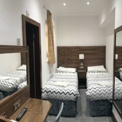 Отель Leisure Inn комната для гостей фото 2