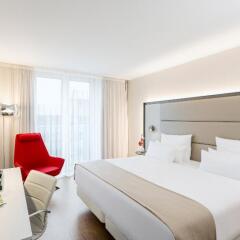 Отель NH Collection Berlin Mitte Am Checkpoint Charlie 4* Стандартный номер с разными типами кроватей фото 47