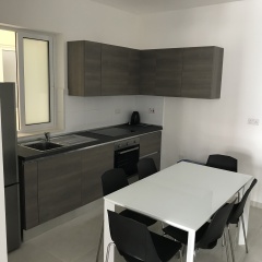 Апартаменты The Village Apartments Буджибба в номере фото 2