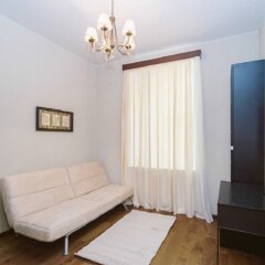 Апартаменты Na Petrogradskoj Apartments Санкт-Петербург комната для гостей