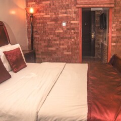 Отель Cotton Suites комната для гостей
