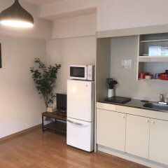 Отель AMP FLAT Nishijin 3 Фукуока в номере фото 2