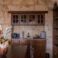 Отель Kayakapi Premium Caves Cappadocia в номере