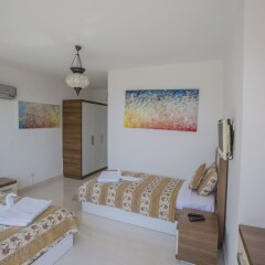 Villa Motion 2 by Akdenizvillam Турция, Калкан - отзывы, цены и фото номеров - забронировать отель Villa Motion 2 by Akdenizvillam онлайн комната для гостей фото 5