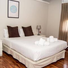 Отель Apartamentos Madanis - Hospitalet de Llobregat Испания, Оспиталет-де-Льобрегат - отзывы, цены и фото номеров - забронировать отель Apartamentos Madanis - Hospitalet de Llobregat онлайн комната для гостей фото 4