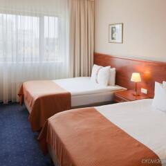 Отель Holiday Inn Vilnius Литва, Вильнюс - отзывы, цены и фото номеров - забронировать отель Holiday Inn Vilnius онлайн комната для гостей фото 3