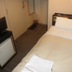 Отель Hospitality In Yawatajuku Камагая удобства в номере фото 2