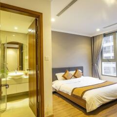 Апартаменты Bayhomes Times City Serviced Apartment комната для гостей фото 2