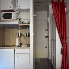 Апартаменты Studio Near Porte Maillot & Arc De Triomphe в номере