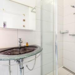 Отель Iq130 Apartment Hotel Швейцария, Цюрих - отзывы, цены и фото номеров - забронировать отель Iq130 Apartment Hotel онлайн ванная