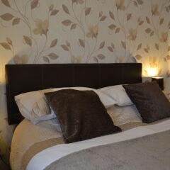 Отель The Sandpiper Guest House сейф в номере