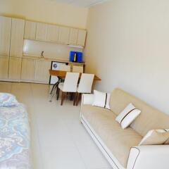Апартаменты Yaman Apartment Cappadocia Аванос комната для гостей фото 4