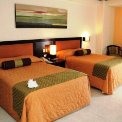 Hotel El Conquistador del Paseo de Montejo сейф в номере