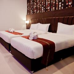 Отель 101 Holiday Suites На Чом Тхиан комната для гостей