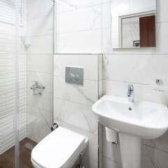 Отель Rüzgargülü Otel Бозджаада ванная