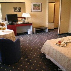 Отель Amadeus Hotel Италия, Болонья - 1 отзыв об отеле, цены и фото номеров - забронировать отель Amadeus Hotel онлайн удобства в номере фото 2