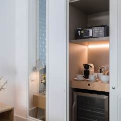 Отель Boutique Chiado Suites сейф в номере