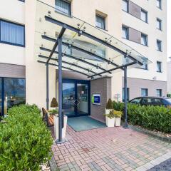 Отель Holiday Inn Express Köln-Mülheim Германия, Кёльн - 10 отзывов об отеле, цены и фото номеров - забронировать отель Holiday Inn Express Köln-Mülheim онлайн вид на фасад