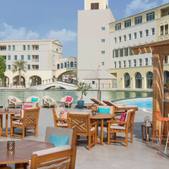 Отель Courtyard by Marriott Dubai Green Community бассейн фото 3