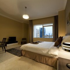 Magnum Hotel & Suites West Bay in Doha, Qatar from 260$, photos, reviews - zenhotels.com guestroom