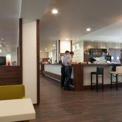 Отель Motel Plus Berlin гостиничный бар
