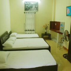 Отель Homestay Hong Cong Хойан комната для гостей