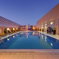 Abidos Hotel Apartment, Dubailand бассейн фото 2