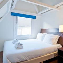 Отель Rembrandtplein Apartment Suites Нидерланды, Амстердам - отзывы, цены и фото номеров - забронировать отель Rembrandtplein Apartment Suites онлайн комната для гостей