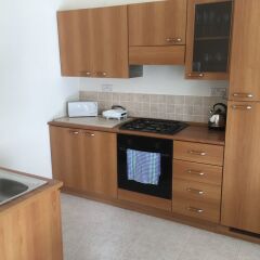 Апартаменты Senglea Seafront Apartment в номере