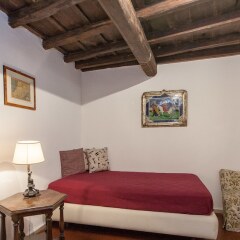 Апартаменты Rental in Rome Arco Ciambella Studio Рим комната для гостей фото 2